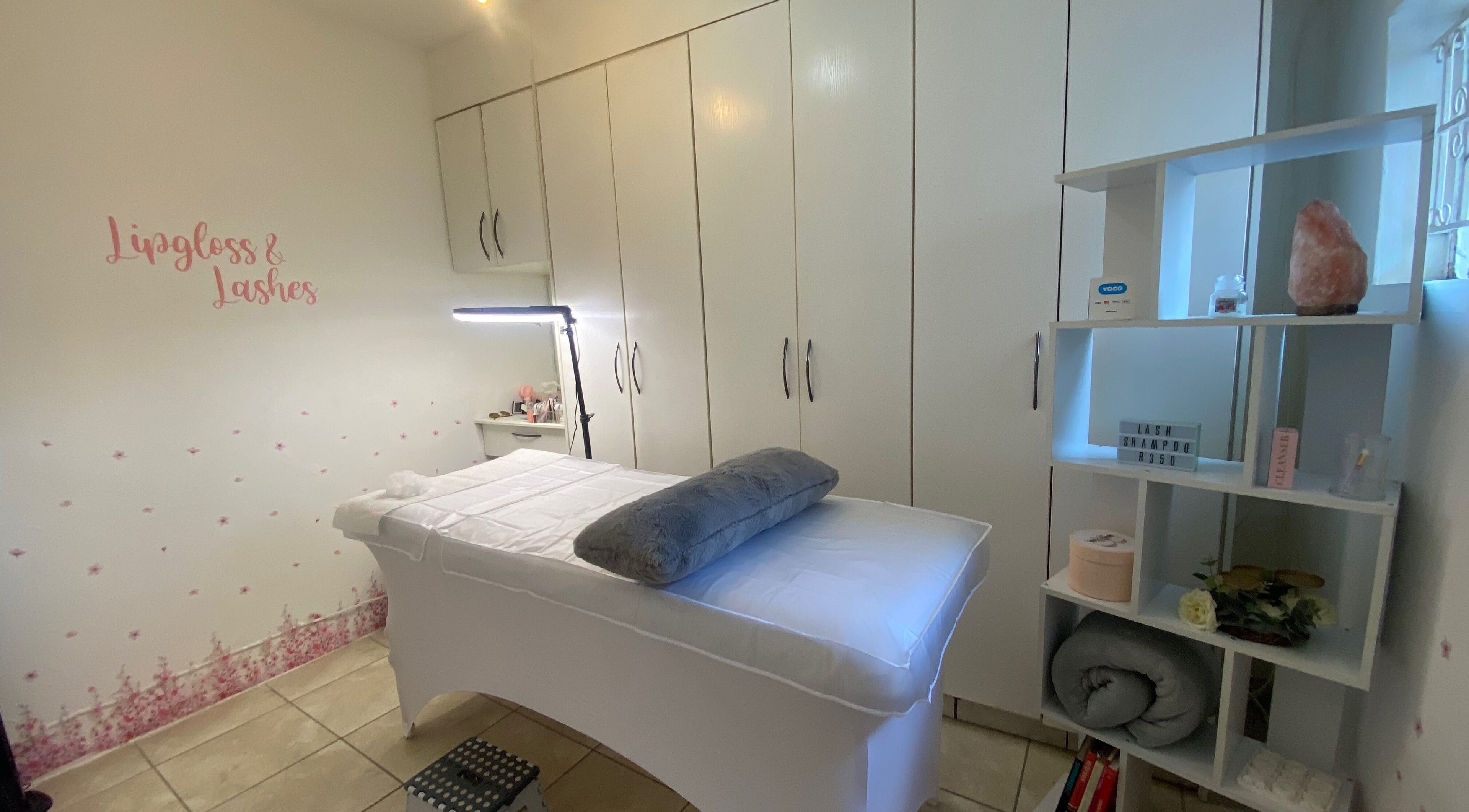 A tranquil treatment room at Lipgloss and Lashes Norwood, Johannesburg, Gauteng, ZA with a comfortable bed.