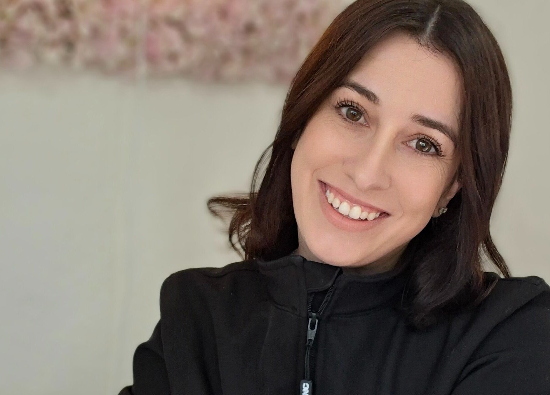 Friendly staff at Lipgloss and Lashes Norwood, Johannesburg, Gauteng, ZA, welcoming clients with a radiant smile.