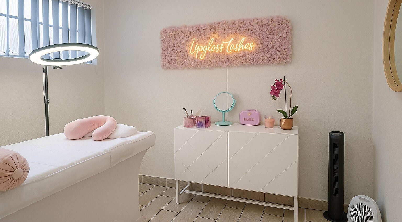 Serene spa room at Lipgloss and Lashes Woodmead, Sandton, Gauteng, ZA, featuring a massage bed and soft lighting.