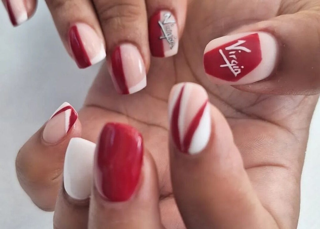 Stylish red and white nail art at michdylan, Benoni, Gauteng, ZA.