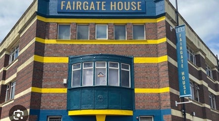 Definedbylashes venue at Fairgate House, Birmingham, England, GB, showcasing a distinctive brick façade.