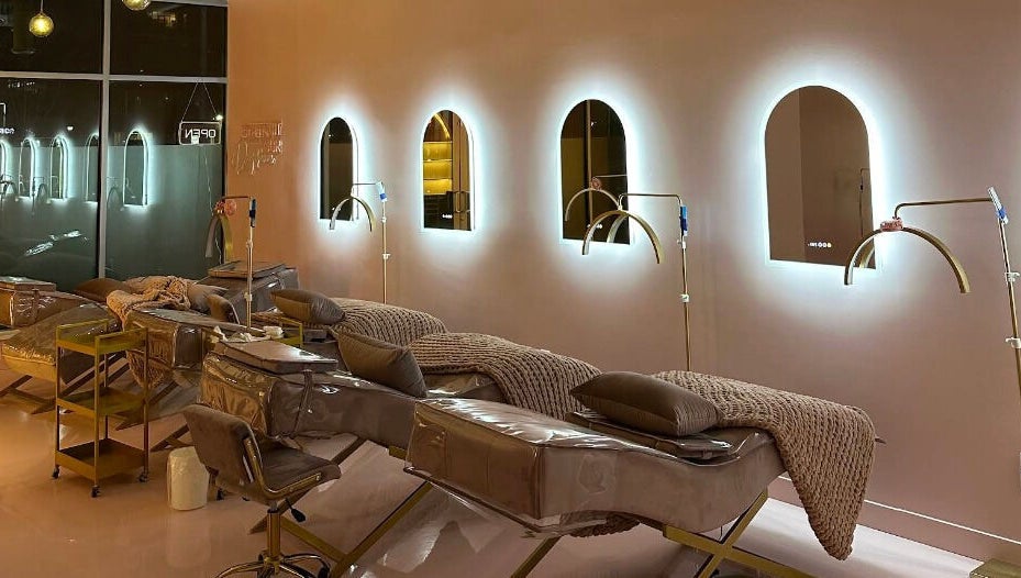 Relaxing treatment beds at The Glam Lab, Richmond, British Columbia, CA, offering a tranquil wellness experience.