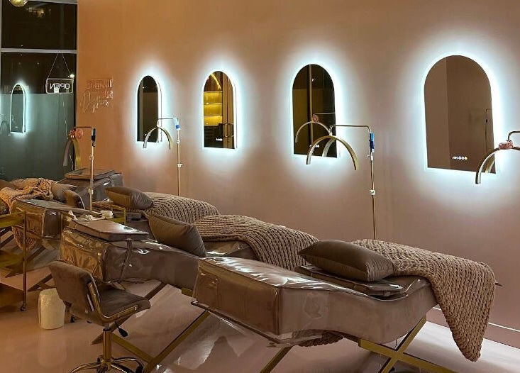 Relaxing treatment beds at The Glam Lab, Richmond, British Columbia, CA, offering a tranquil wellness experience.