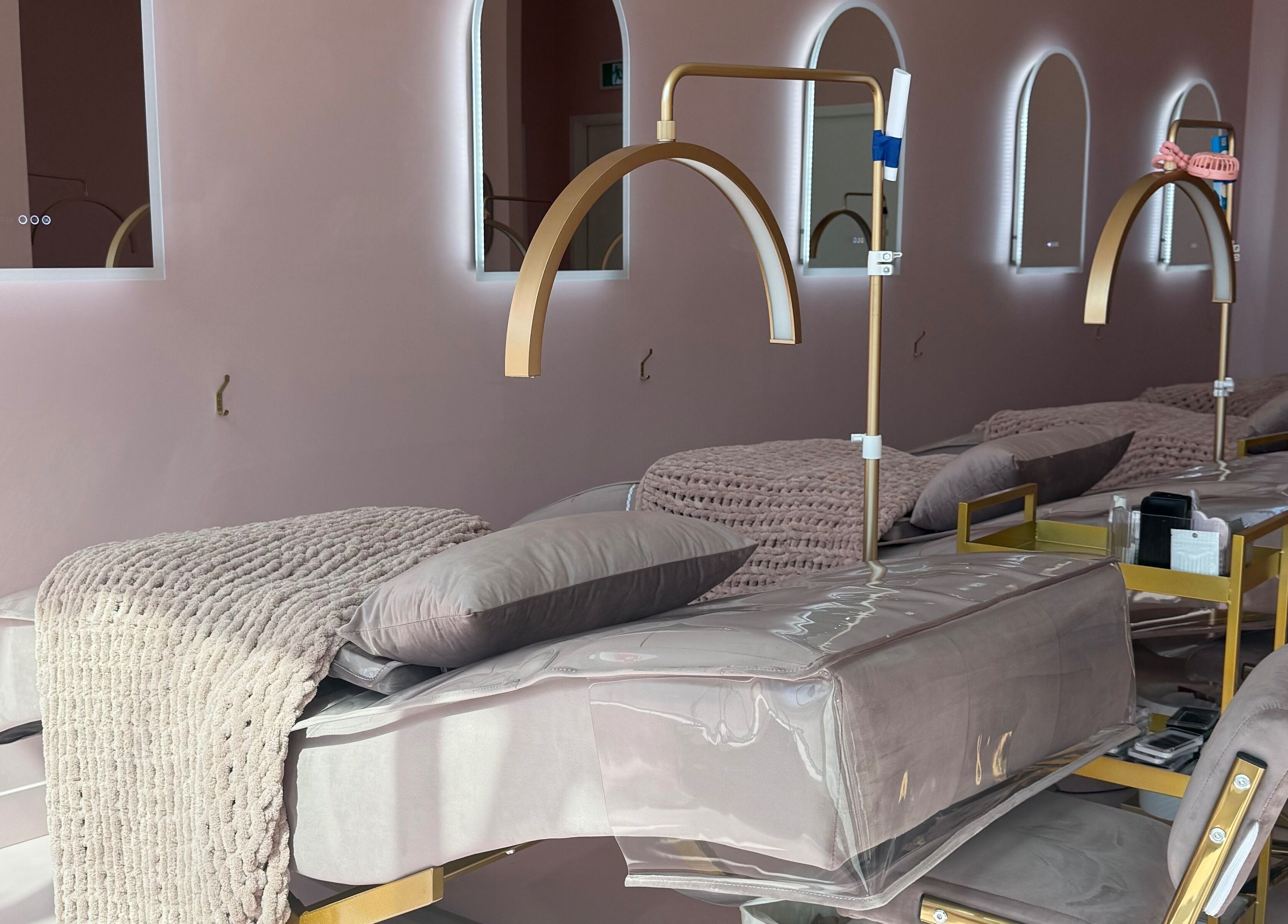 Luxurious treatment area at The Glam Lab, Richmond, British Columbia, CA with plush bedding and elegant decor.