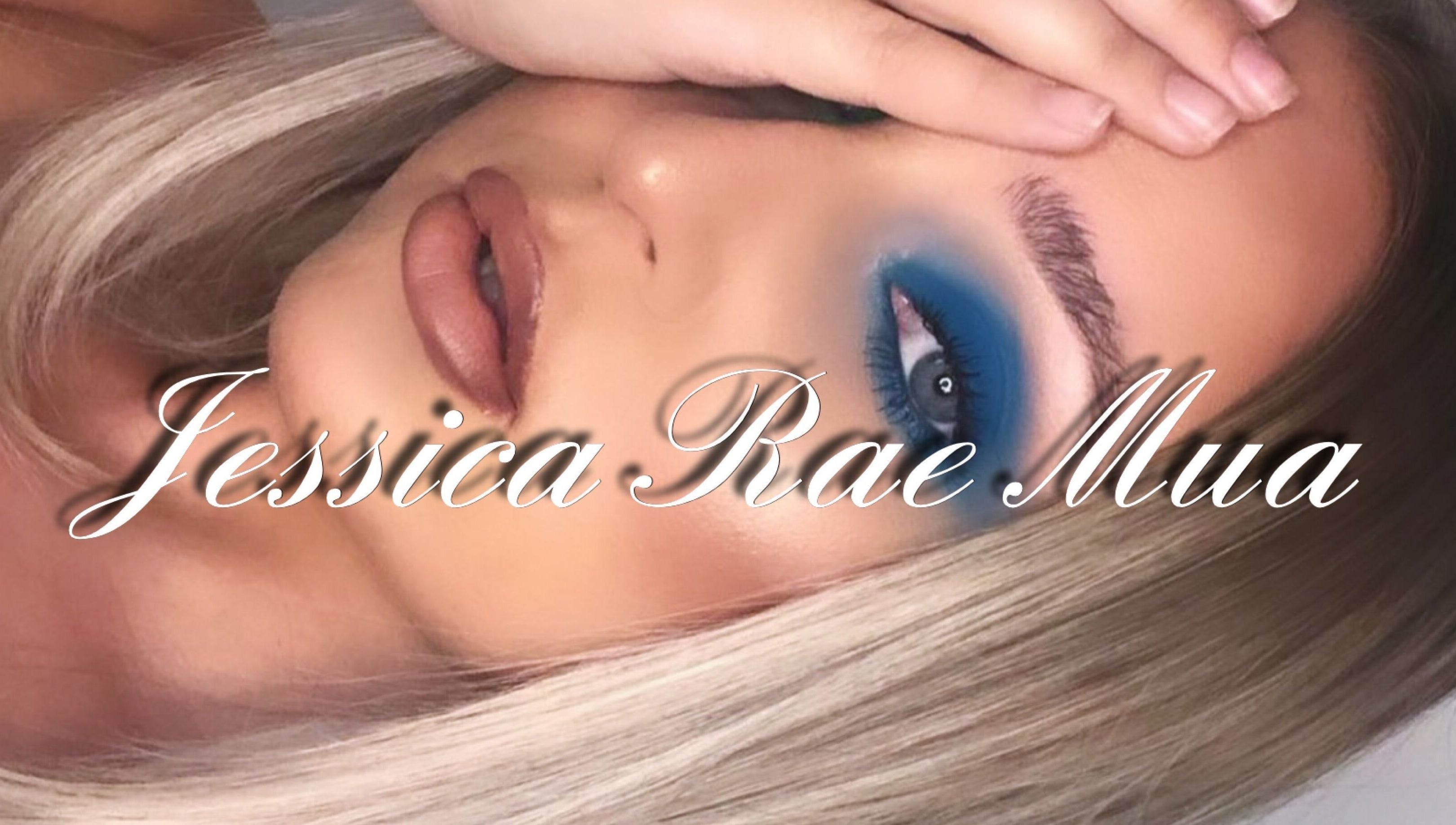 Model with striking blue eye makeup at Jessica Rae MUA, Chester-le-Street, England, GB highlighting artistry.