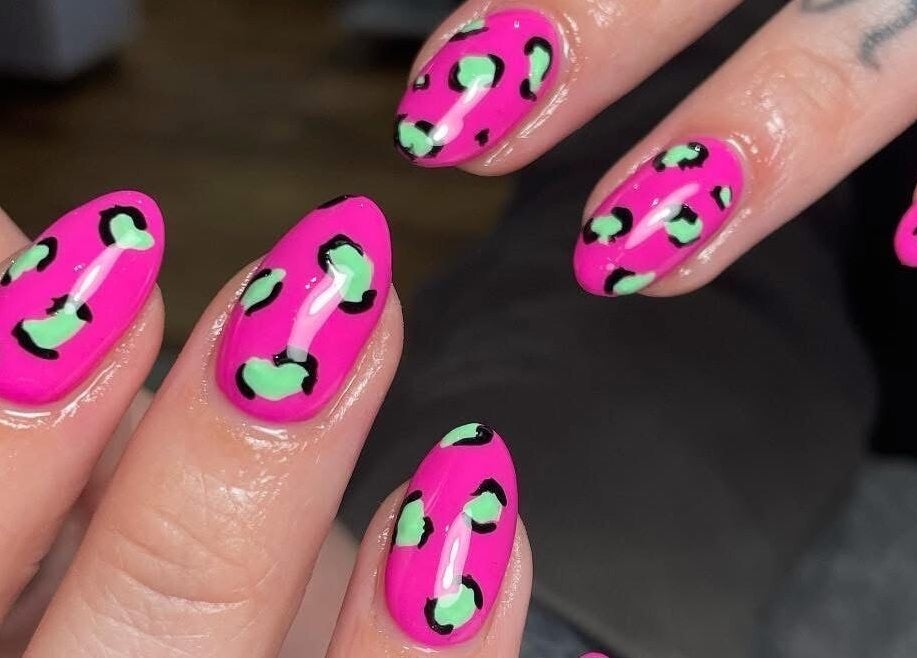 Bright pink leopard print nails by Jessica Rae MUA, located in Chester-le-Street, England, GB.