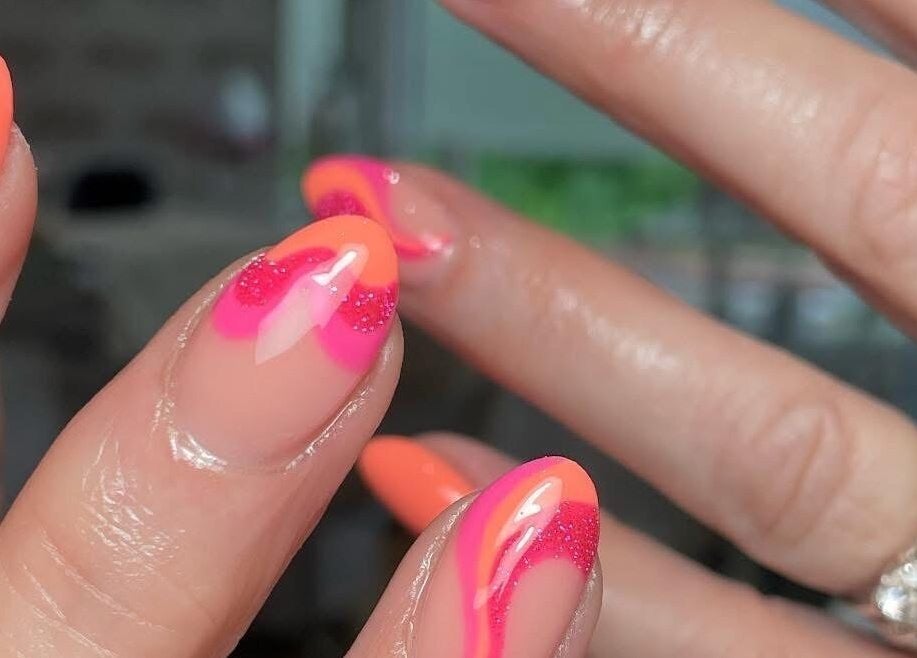 Vibrant pink and orange nail art at Jessica Rae MUA, Chester-le-Street, England, GB.