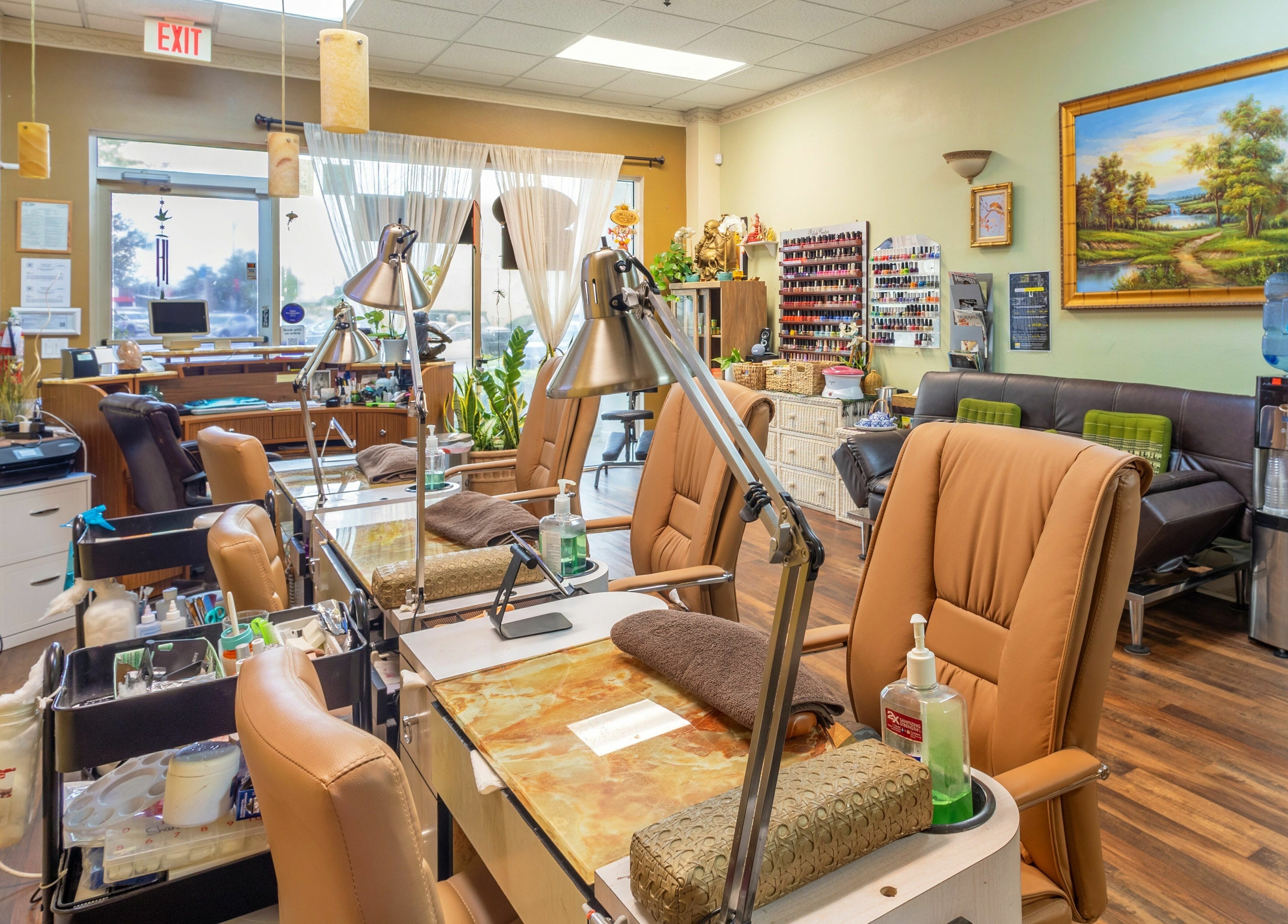 Interior of Perfection Nails and Spa, Merritt Island, Florida showcasing comfortable nail stations.