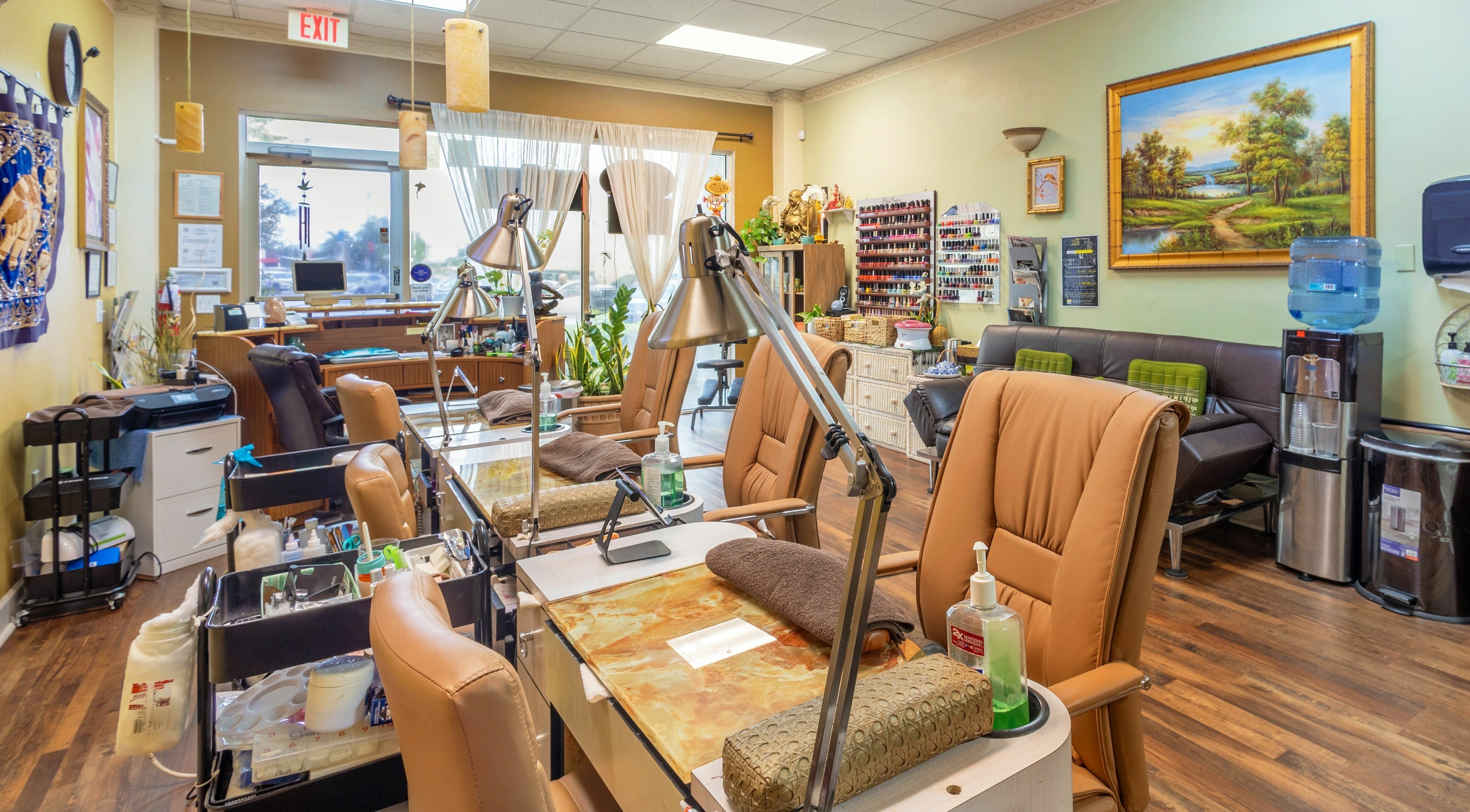 Interior of Perfection Nails and Spa, Merritt Island, Florida showcasing comfortable nail stations.