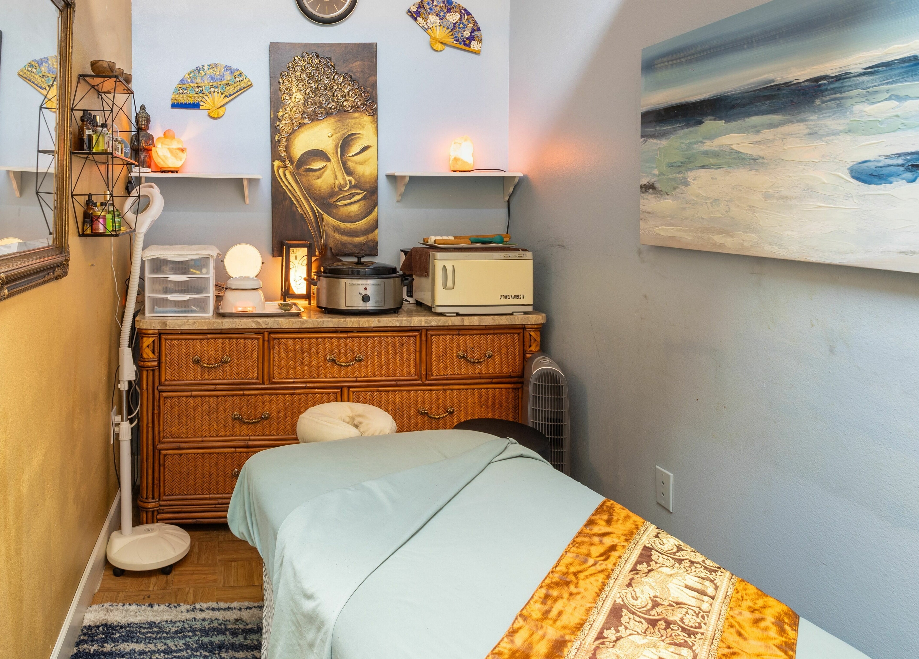 Serene massage room at Perfection Nails and Spa, Merritt Island, Florida, US, featuring calming decor.