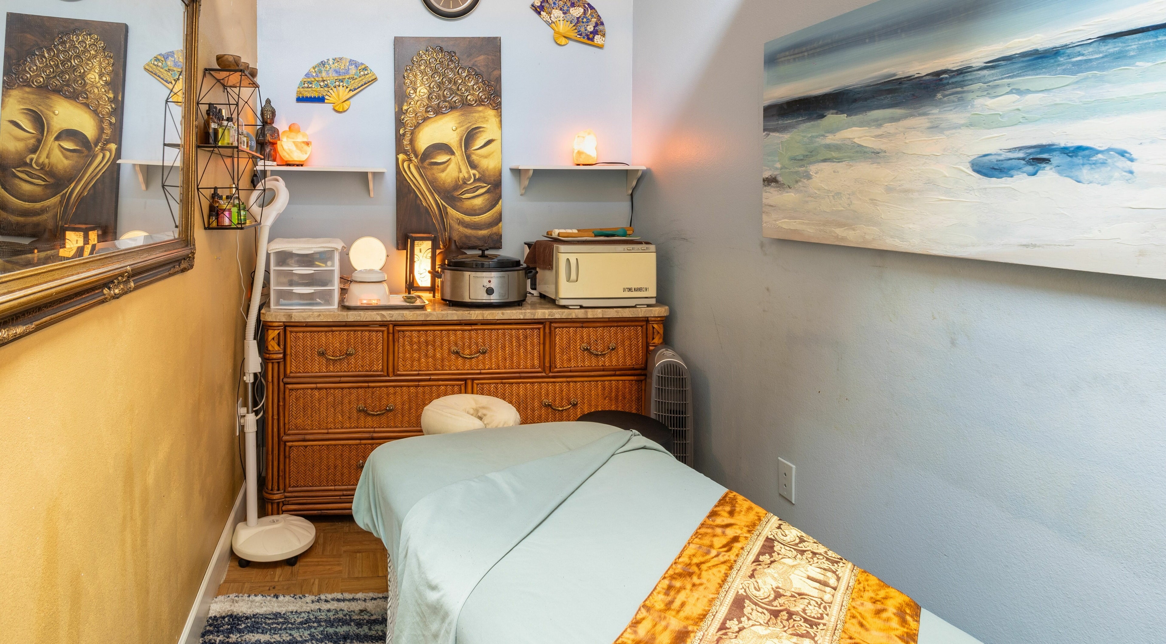 Serene massage room at Perfection Nails and Spa, Merritt Island, Florida, US, featuring calming decor.