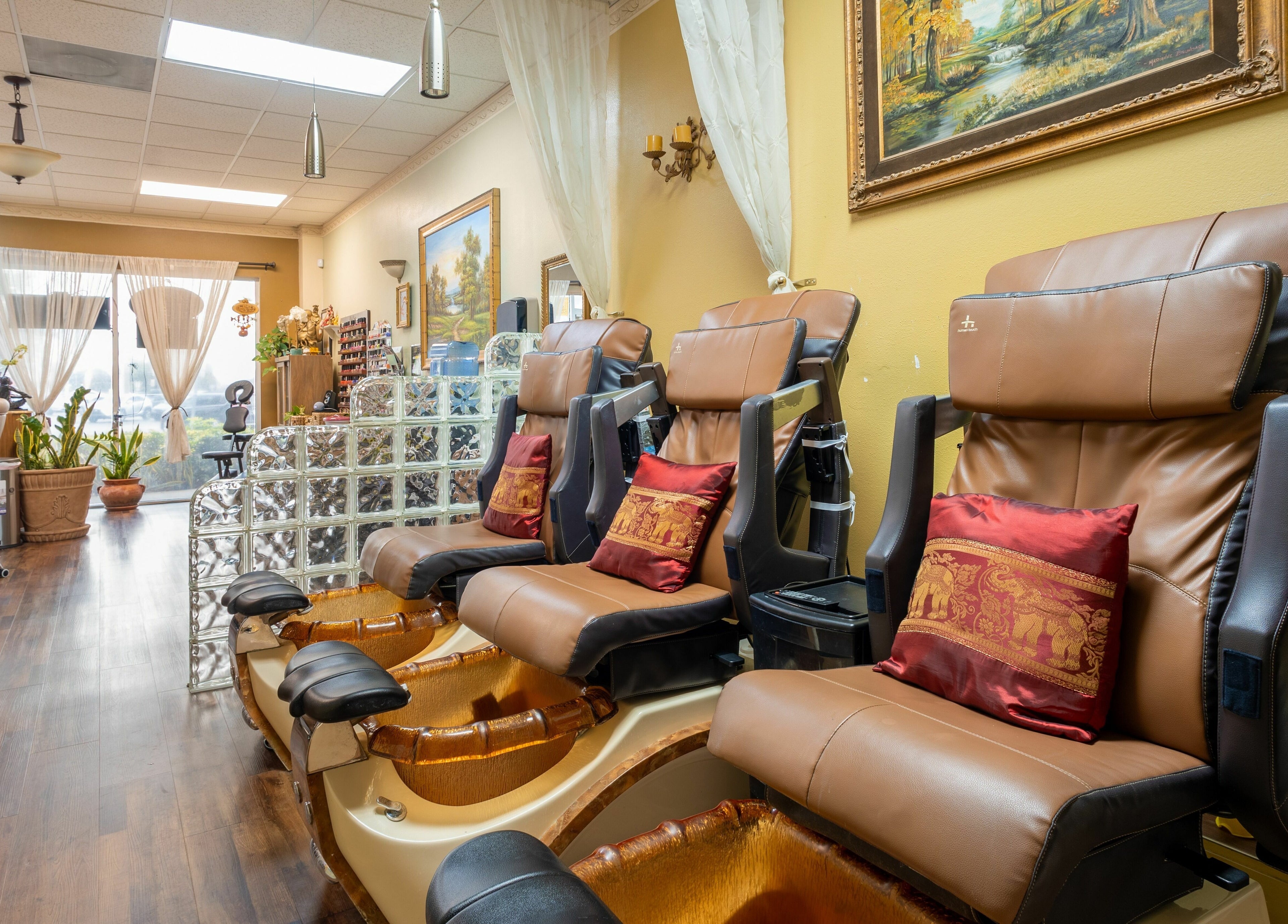 Pedicure chairs at Perfection Nails and Spa, Merritt Island, Florida, US inviting relaxation.