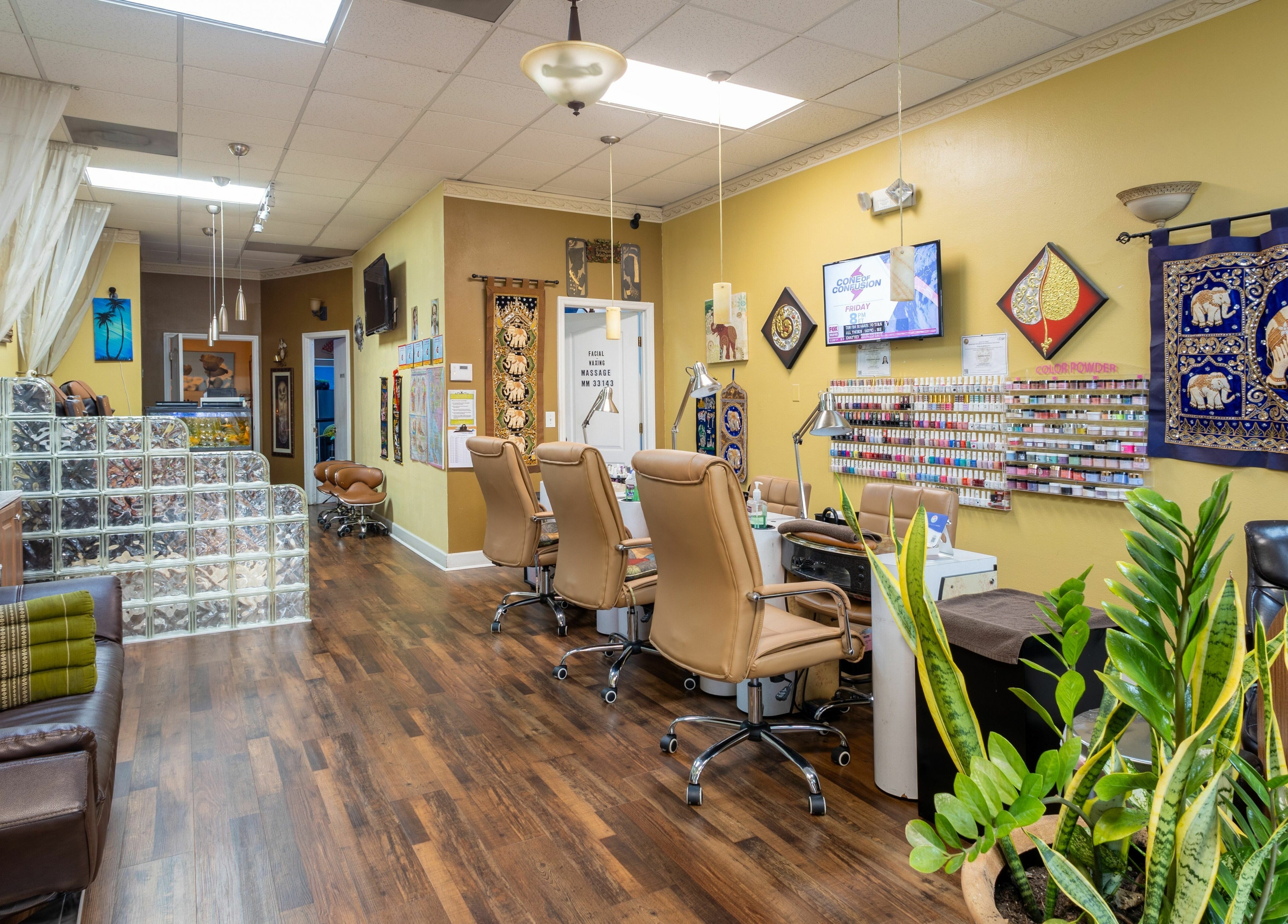 Cozy interior of Perfection Nails and Spa in Merritt Island, Florida, US, featuring elegant nail stations.