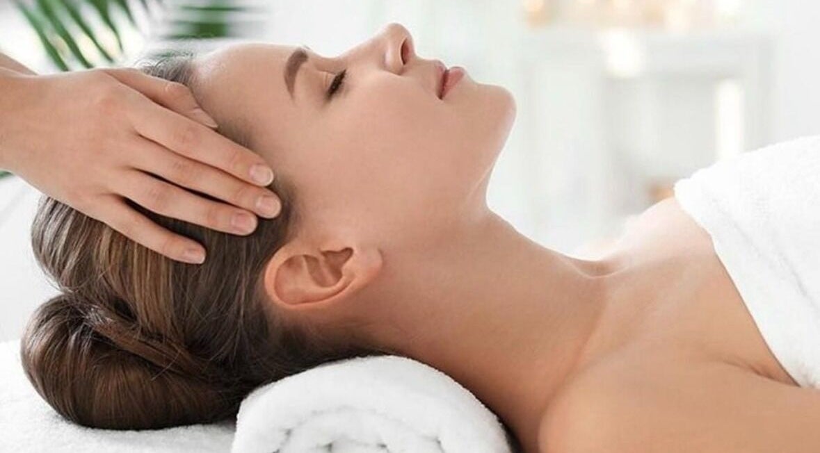 Relaxing massage at Lou Lou Couture Beauty, Runaway Bay, Queensland, AU, enhancing wellness and tranquility.