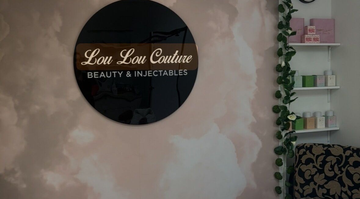 Lou Lou Couture Beauty sign and products at Runaway Bay, Queensland, AU, showcasing a serene and elegant setting.