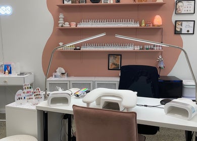 Gloss Salon's stylish manicure setup in Mangawhai, Northland, NZ features modern decor and professional tools.