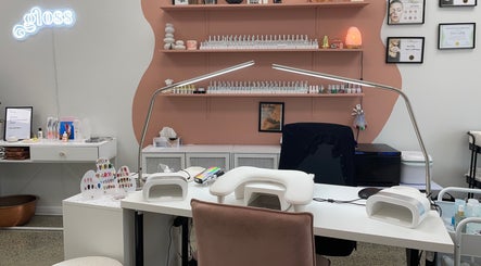 Gloss Salon's stylish manicure setup in Mangawhai, Northland, NZ features modern decor and professional tools.