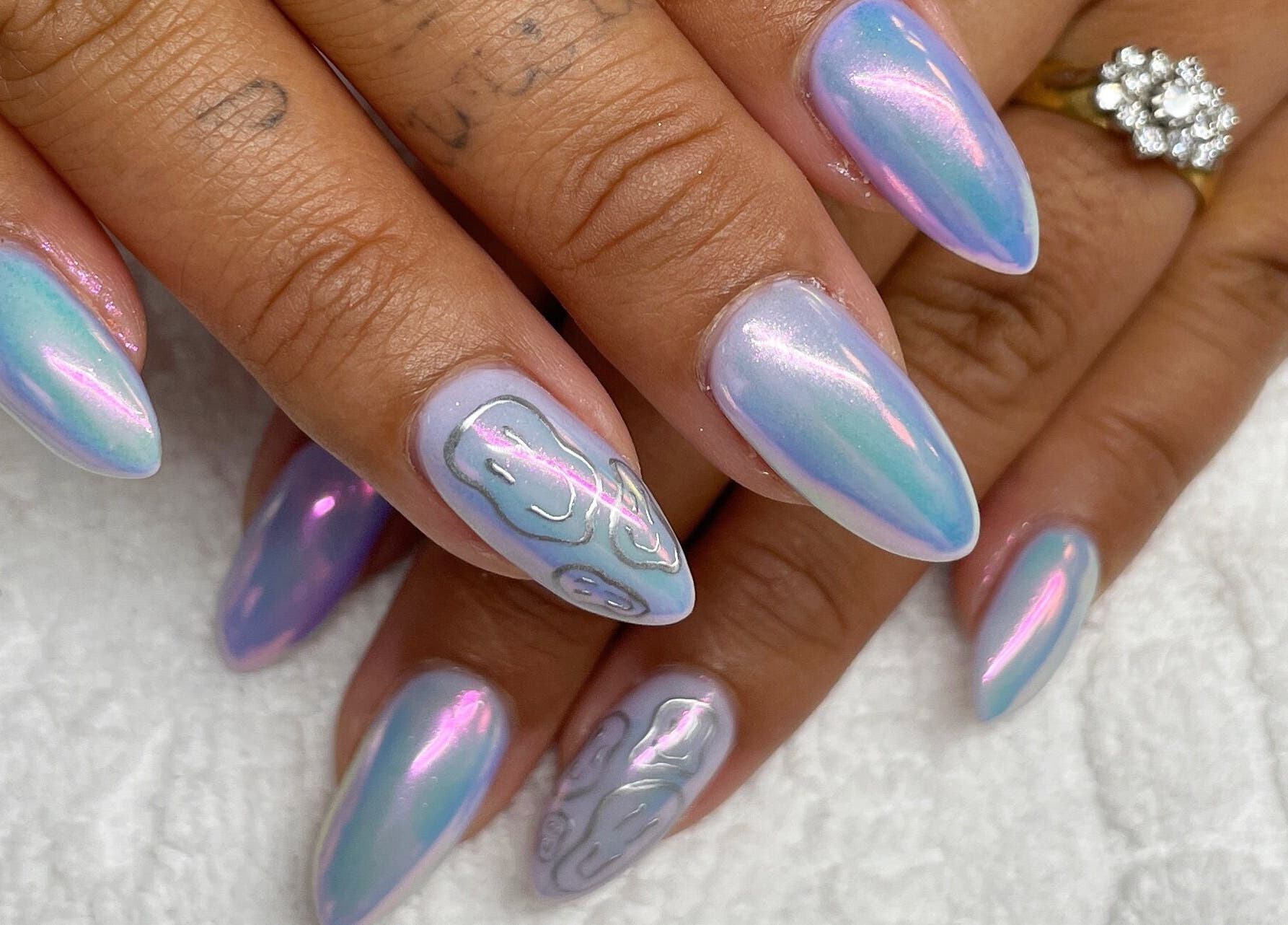 Iridescent nail art at Gloss Salon, Mangawhai, Northland, NZ showcasing glossy, detailed designs.