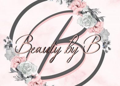 BeautybyB logo with floral design in Berkshire, England GB. Elegant beauty and wellness branding.