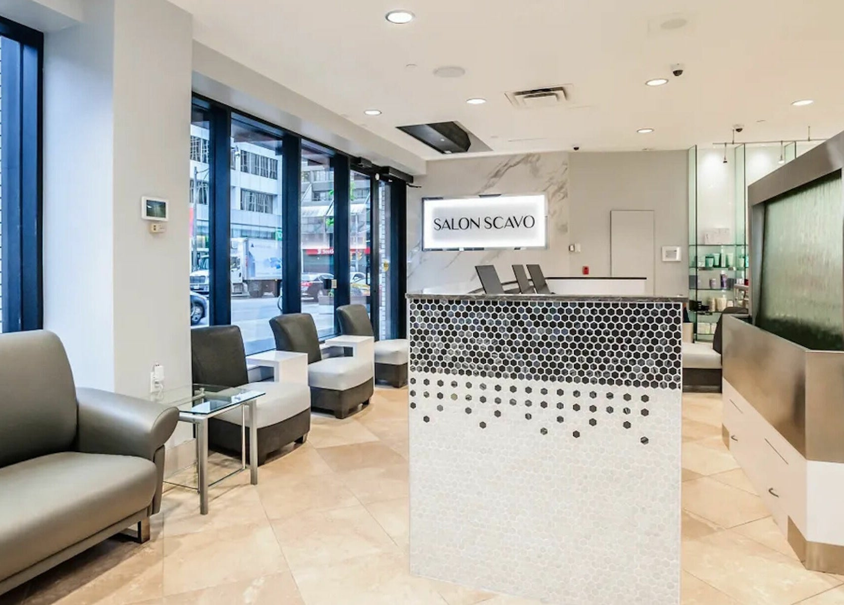 Salon Scavo's welcoming lounge in Toronto, Ontario, CA, featuring modern décor and comfortable seating.