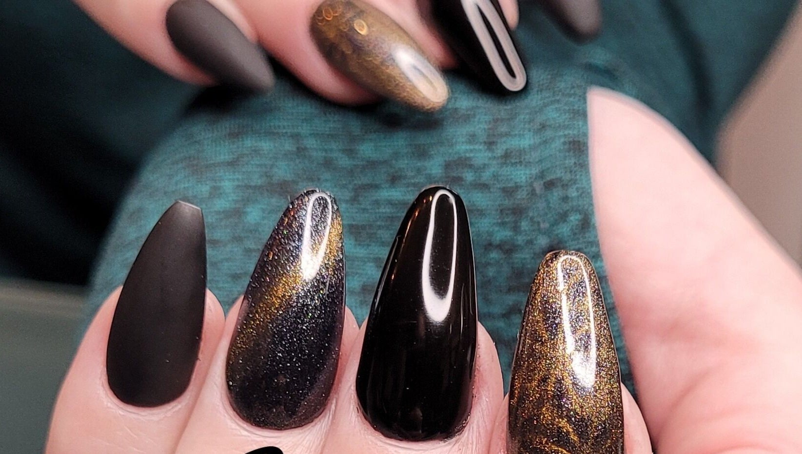 Elegant black and gold nail art at Nails by Snow, Pretoria, Gauteng, ZA.