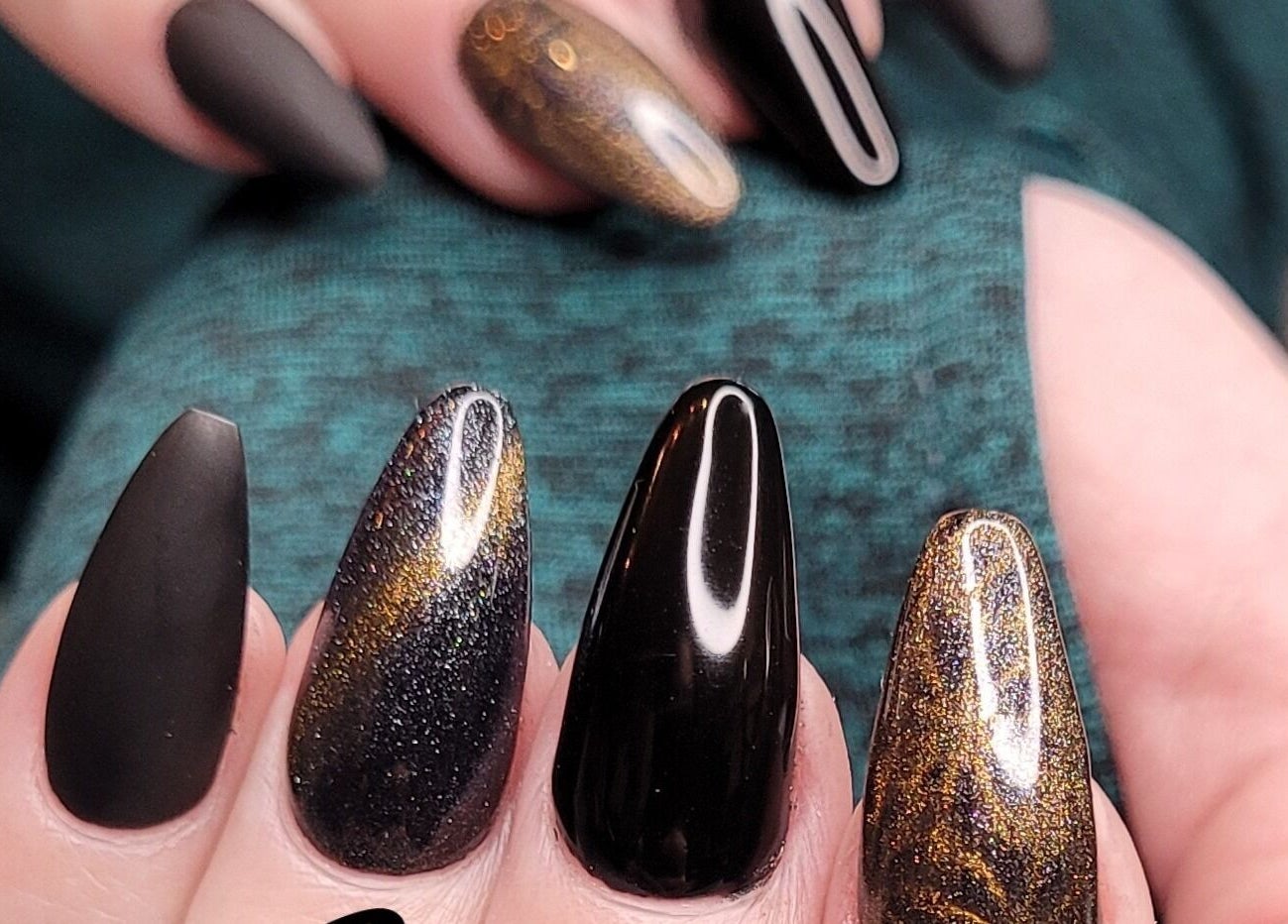 Elegant black and gold nail art at Nails by Snow, Pretoria, Gauteng, ZA.