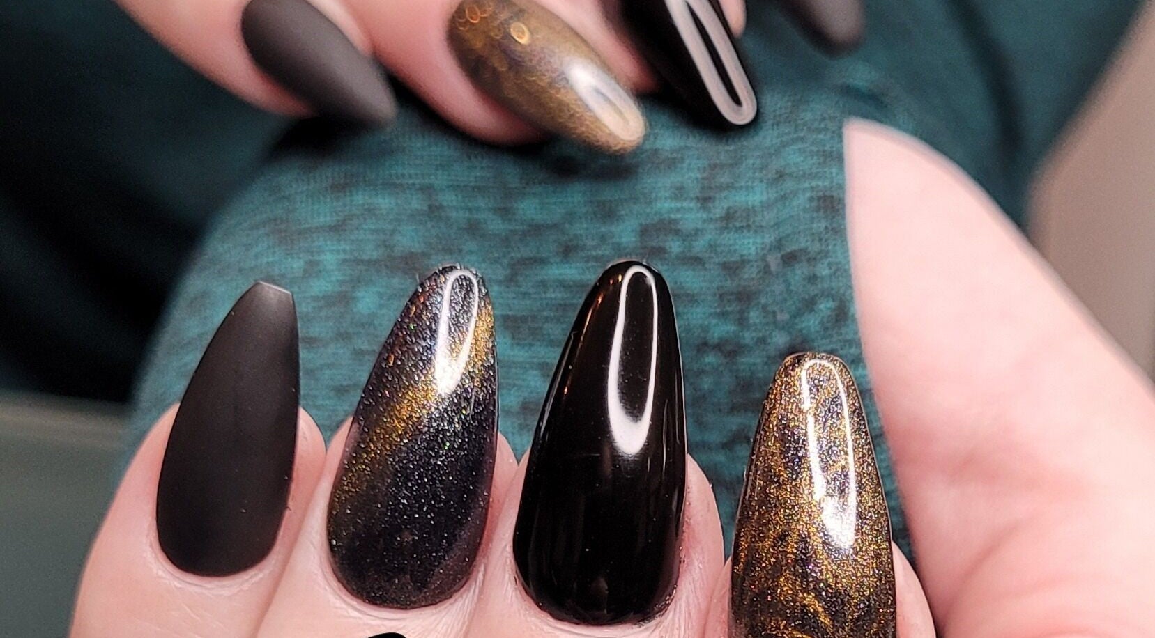 Elegant black and gold nail art at Nails by Snow, Pretoria, Gauteng, ZA.