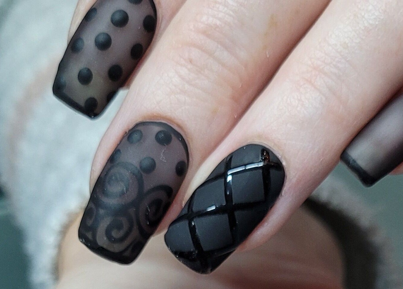 Chic black nail art at Nails by Snow, Pretoria, Gauteng, ZA. Stylish matte and glossy designs.