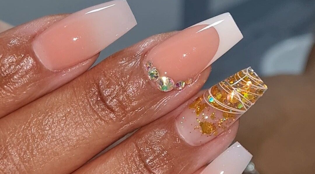 Elegant nail art with crystals at Nellz Nails & Beauty Lounge, Arima, TT. Perfect for a stylish look.