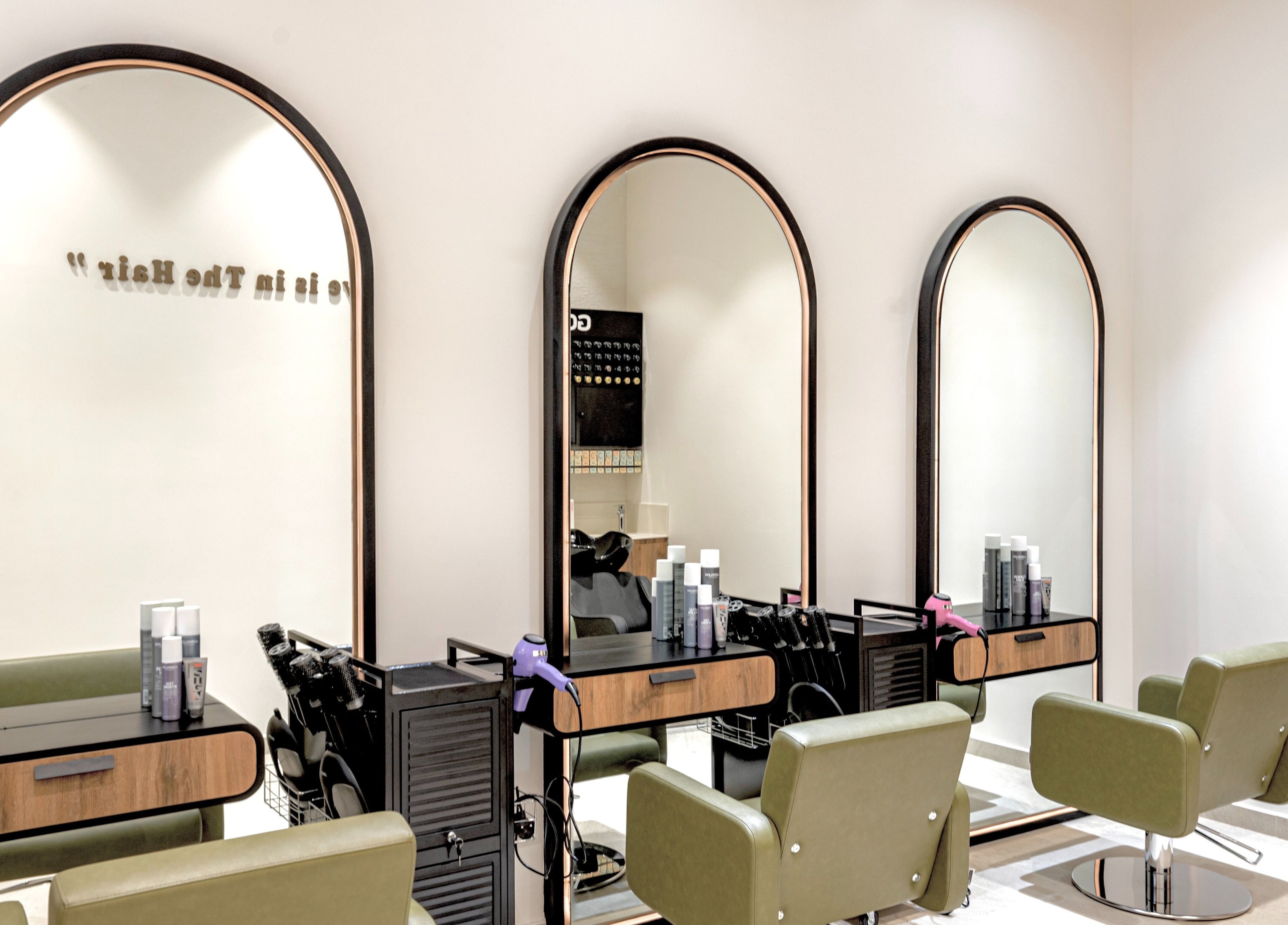 Sleek salon stations at Nails By Dash Beauty Salon, دبي, دبي, AE, with modern mirrors and styling chairs.
