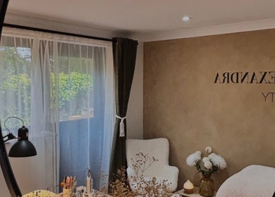 Elegant room at Shayle Alexandra Beauty in Camberley, England, GB with cozy seating and natural light.