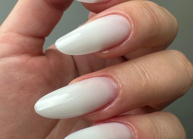 Close-up of elegant white nails done at Aleksa Hair and Beauty, Dublin, County Dublin, IE.