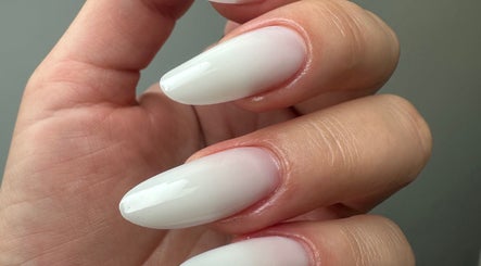 Close-up of elegant white nails done at Aleksa Hair and Beauty, Dublin, County Dublin, IE.