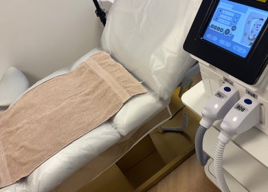 Luxurious treatment room at Glow Skin Bar, Newcastle, England, GB featuring state-of-the-art equipment.