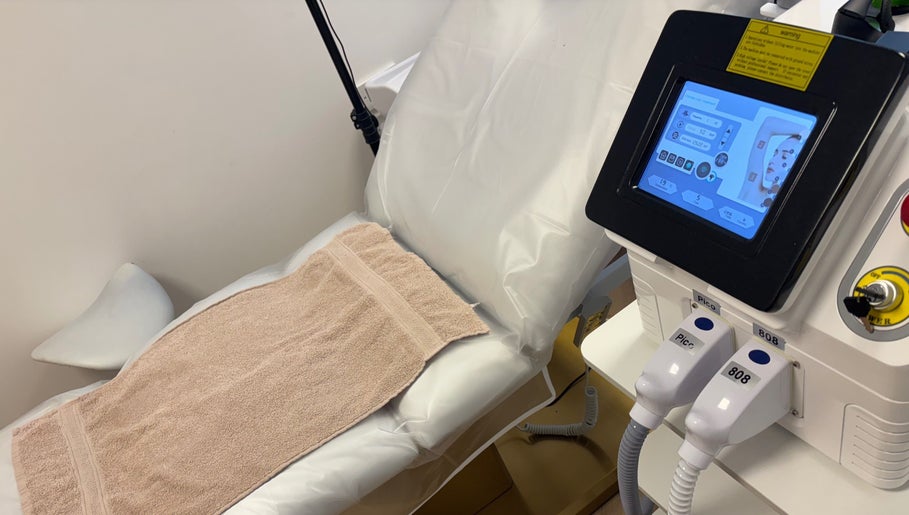 Comfortable treatment bed and modern equipment at Glow Skin Bar, Newcastle, England, GB.