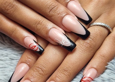 Stylish nail art with black tips at Ria Dharni, Crawley, England, GB.