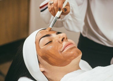 Relaxing facial treatment at Empire Day Spa, Richmond, Victoria, AU, featuring a rejuvenating mask application.