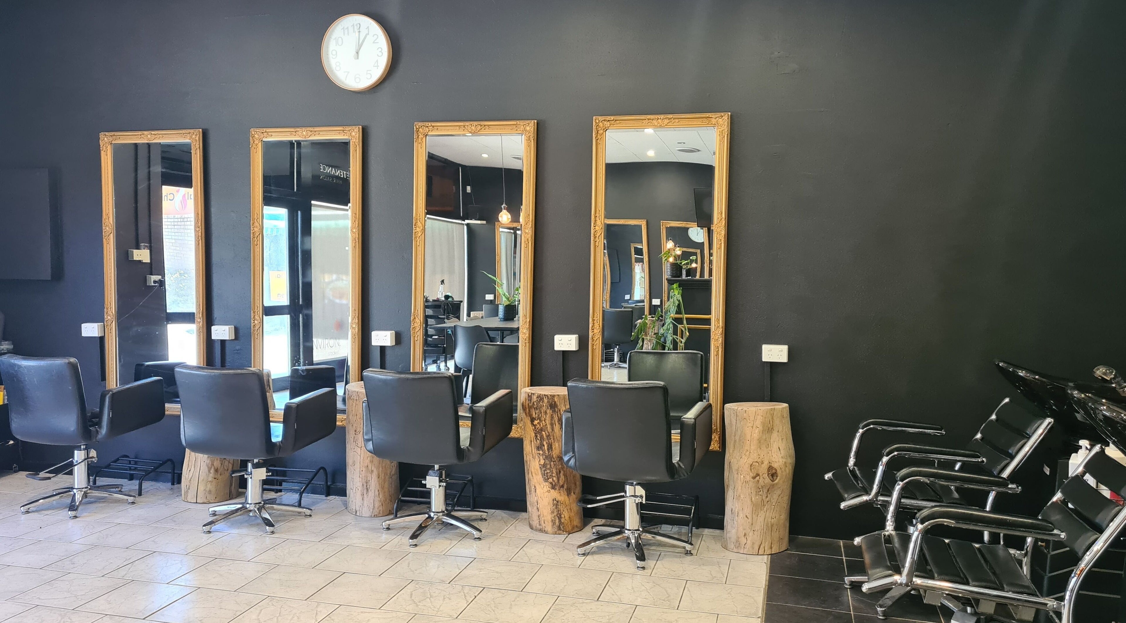 Chic salon setup at Hair Pronto by Laura Jane, Morley, Western Australia, AU with stylish chairs and mirrors.
