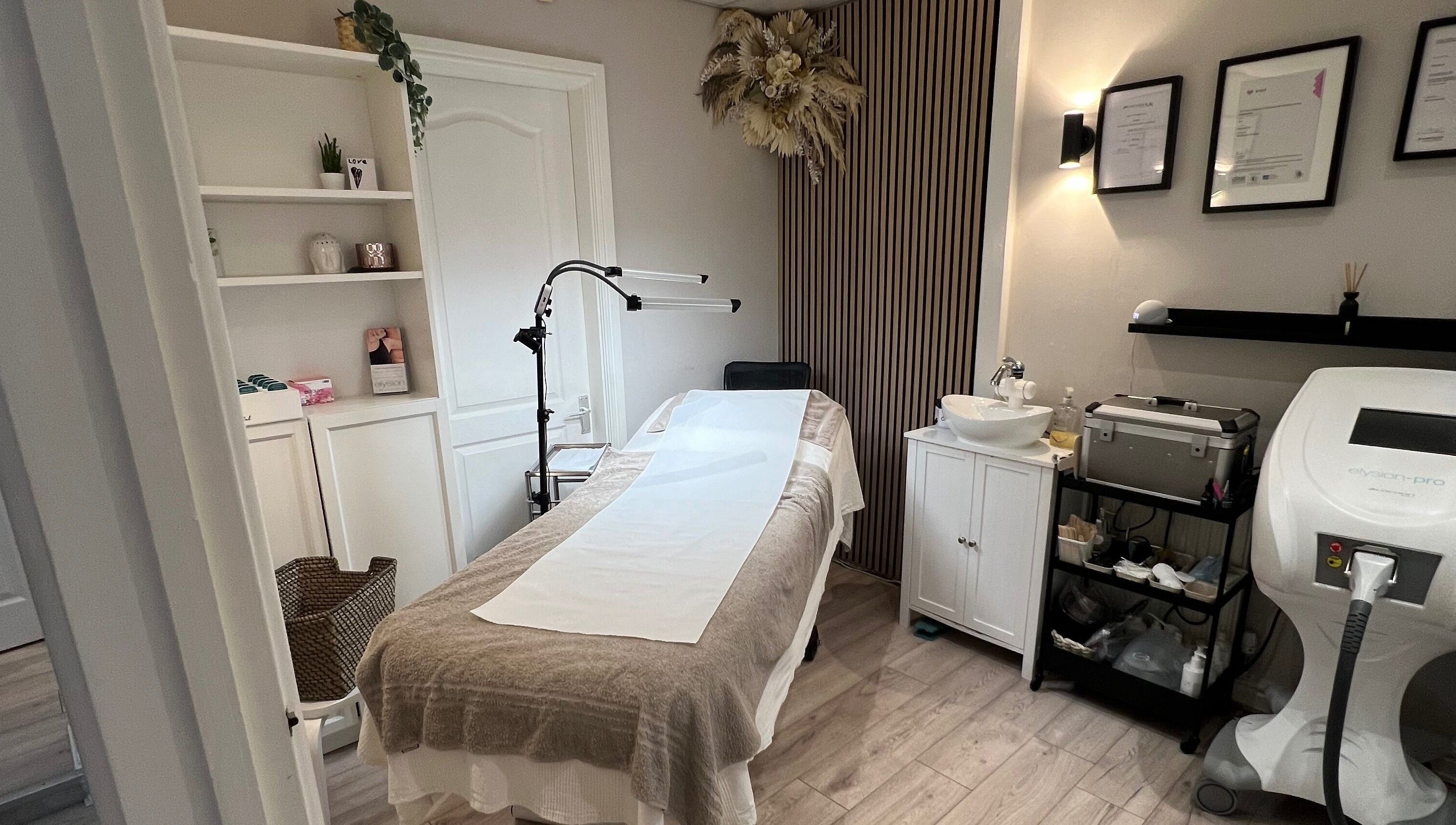 Elegant treatment room at Aesthetically Beautiful in Cheadle, England, GB, offering a calm wellness experience.