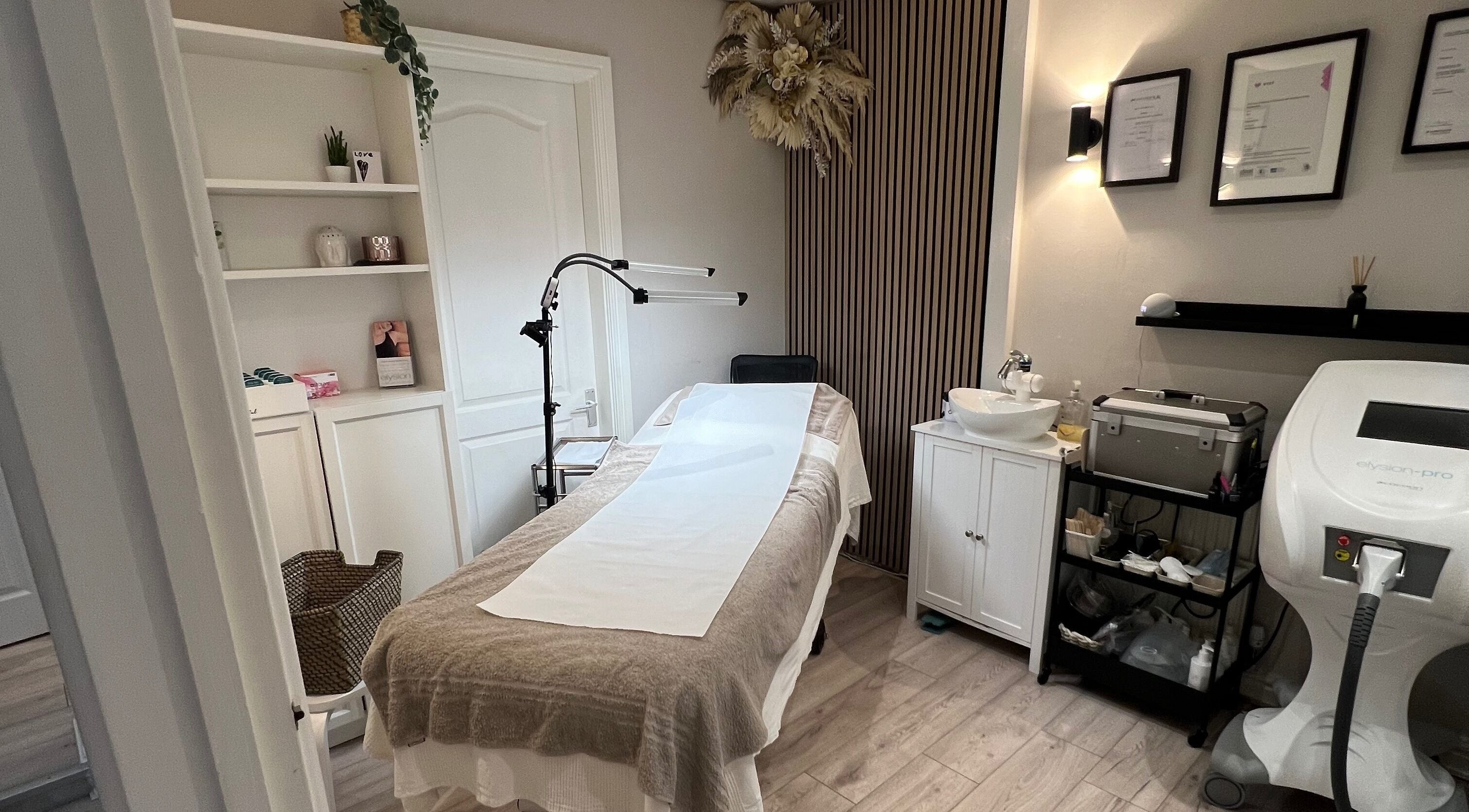 Elegant treatment room at Aesthetically Beautiful in Cheadle, England, GB, offering a calm wellness experience.