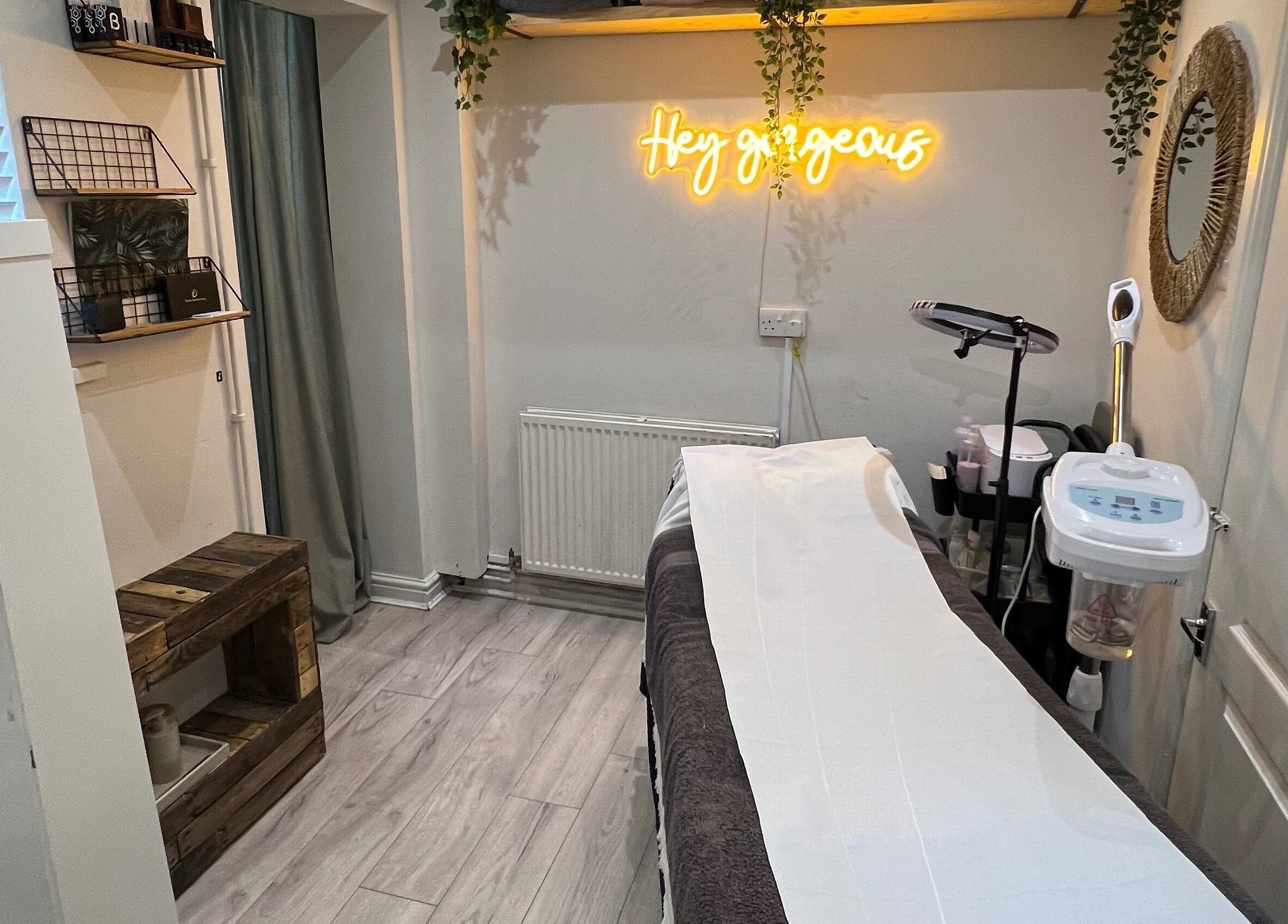 Tranquil treatment room at Aesthetically Beautiful, Cheadle, England, GB with elegant decor and a cozy vibe.