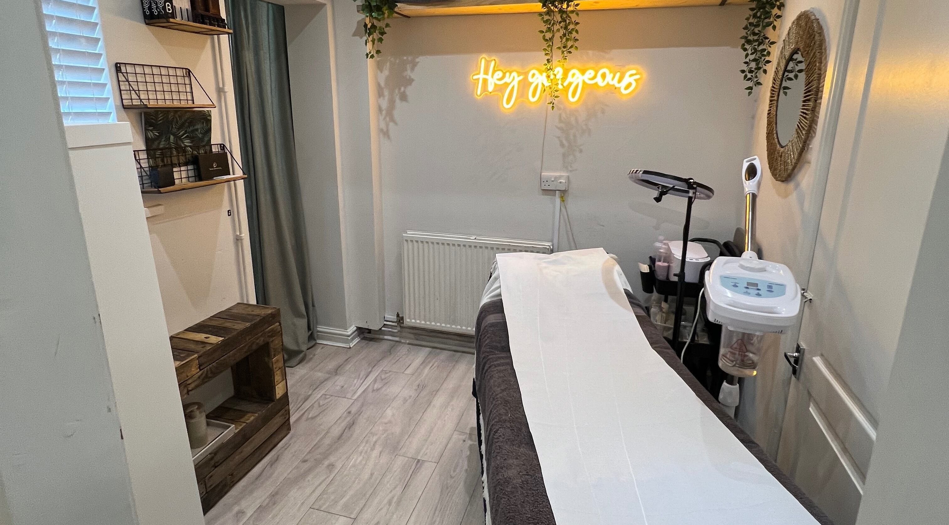 Tranquil treatment room at Aesthetically Beautiful, Cheadle, England, GB with elegant decor and a cozy vibe.