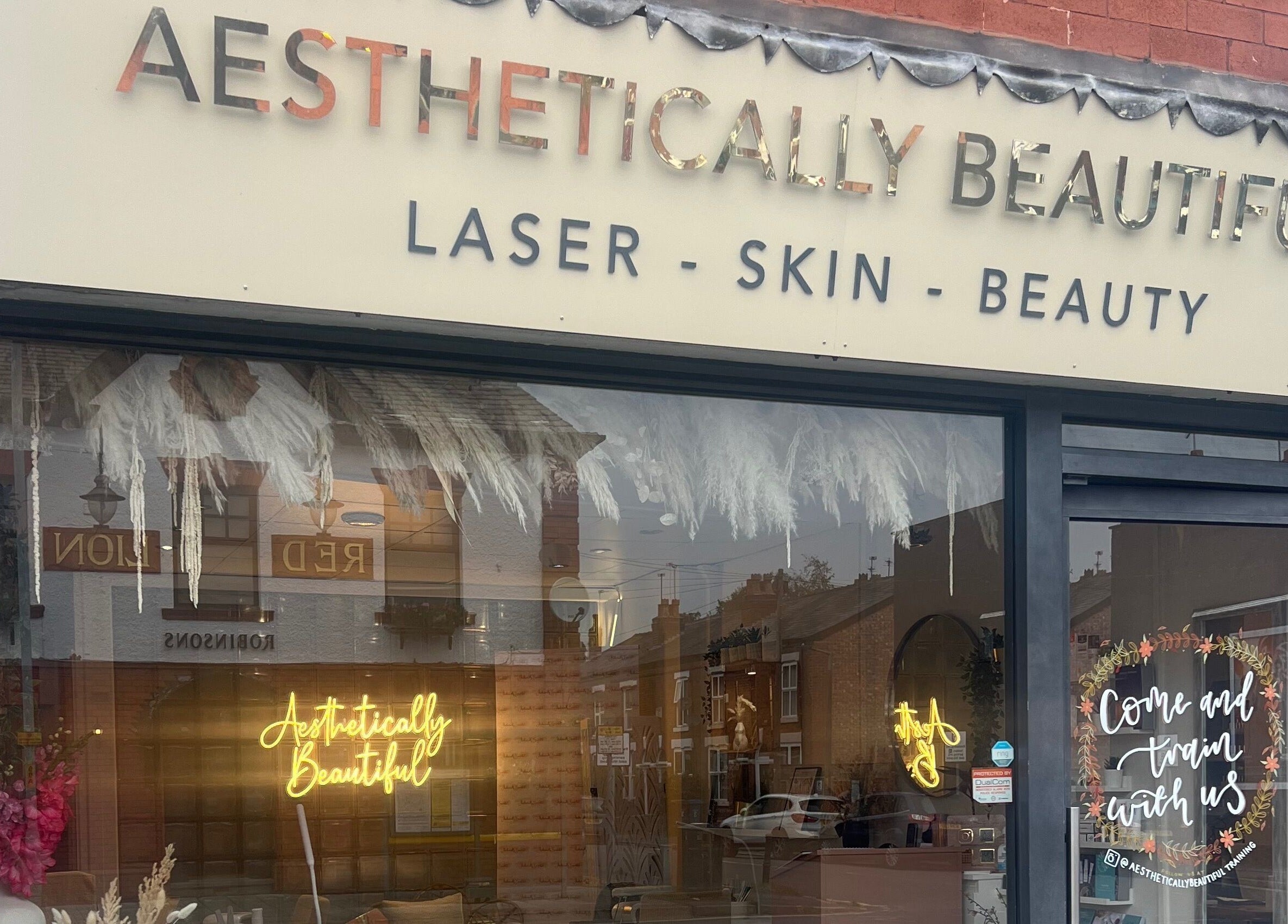 Front view of Aesthetically Beautiful in Cheadle, England, GB showcasing modern aesthetics.
