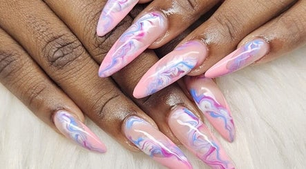 Elegant marble nail art in pink and purple at Jai'sNails, Bridgetown, Saint Michael, BB.