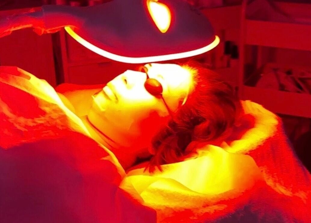 Facial treatment under red light therapy at Balwyn Retreat Sanctuary, Melbourne, Victoria, AU.