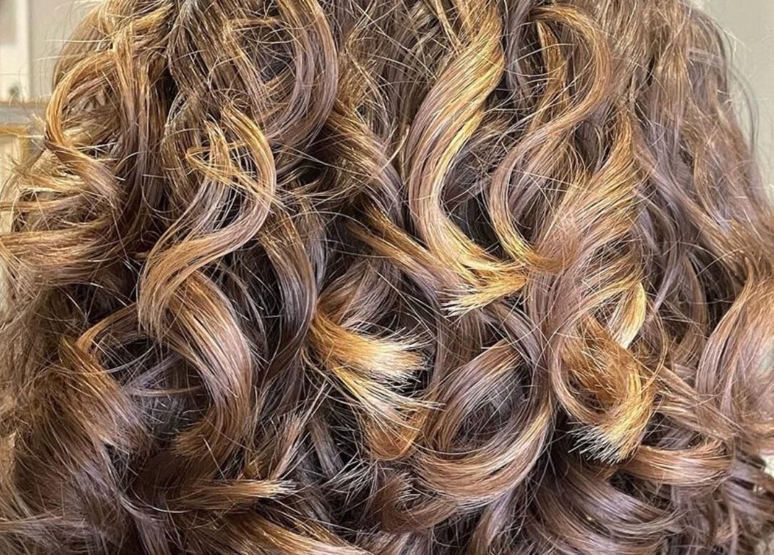 Beautifully styled curls at The Curl Studio in Cullompton, England, GB, showcasing expert hair craftsmanship.