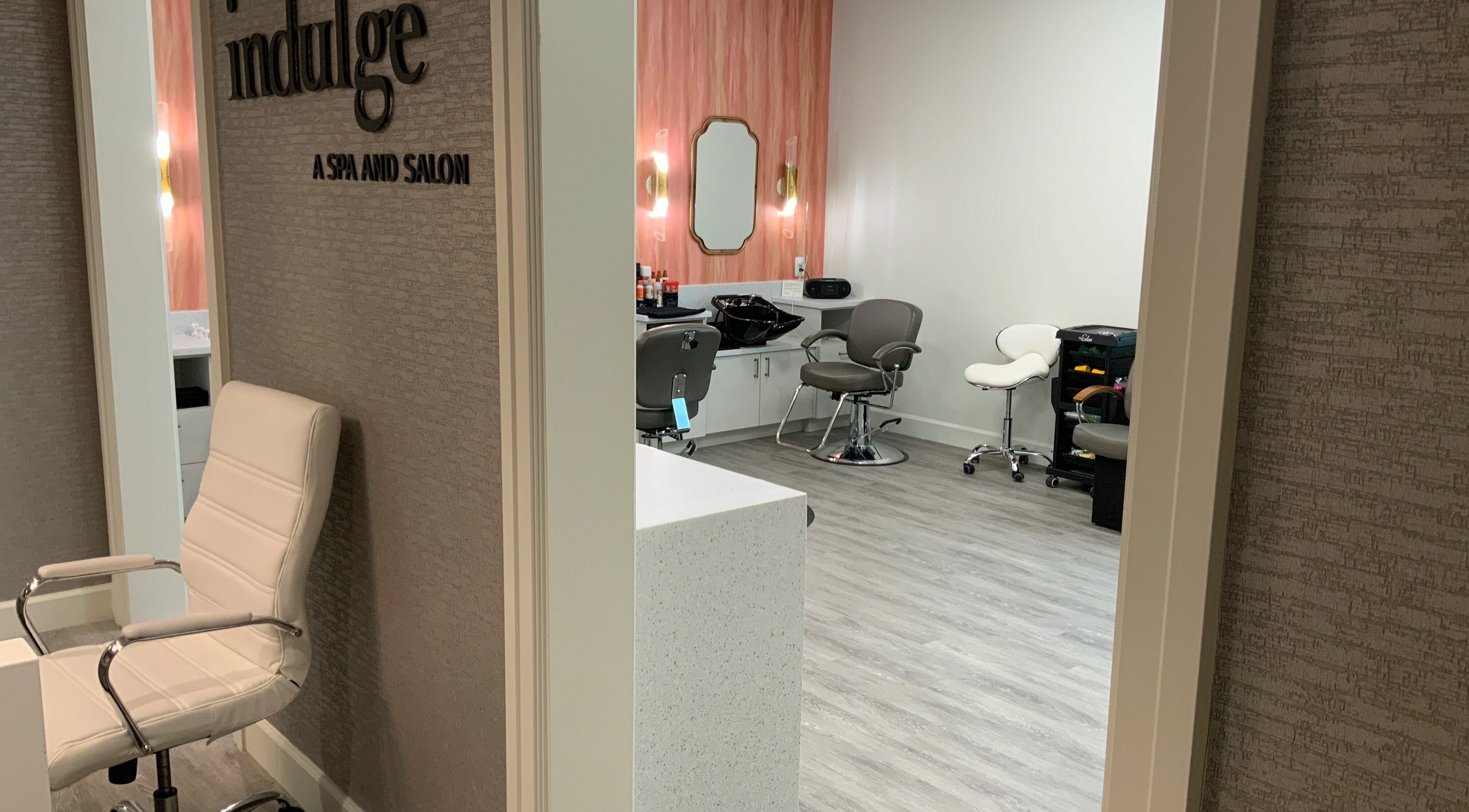 Interior of Indulge at Sky Bridge at Town Center, Upper Marlboro, Maryland, US, showing a chic salon setup.