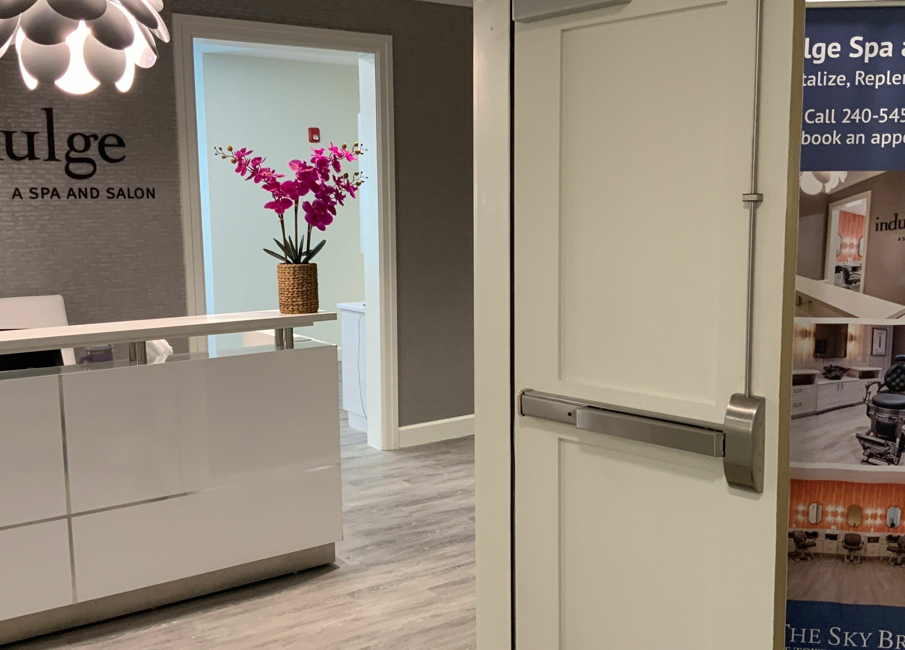 Reception area of Indulge at Sky Bridge at Town Center, Upper Marlboro, Maryland, US with bright decor.