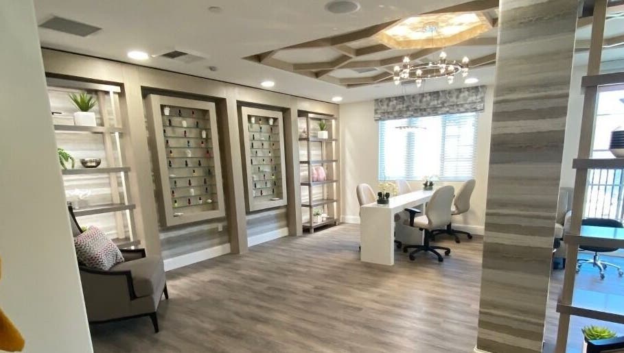 Chic interior of ACOYA Troon Spa Sensi Salon in Scottsdale, Arizona with modern decor and sleek seating.