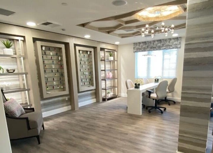 Chic interior of ACOYA Troon Spa Sensi Salon in Scottsdale, Arizona with modern decor and sleek seating.